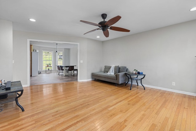 sitting room with recessed lighting, baseboards, hardwood / wood-style floors, and ceiling fan