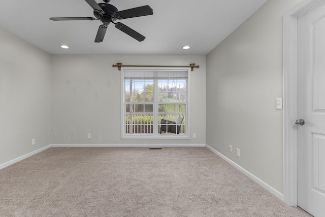 unfurnished room featuring baseboards, recessed lighting, and carpet