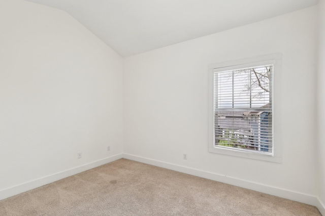 926 Acklen Ave Unit A, Nashville, TN 37203 - carpeted empty room with plenty of natural light, baseboards, and lofted ceiling