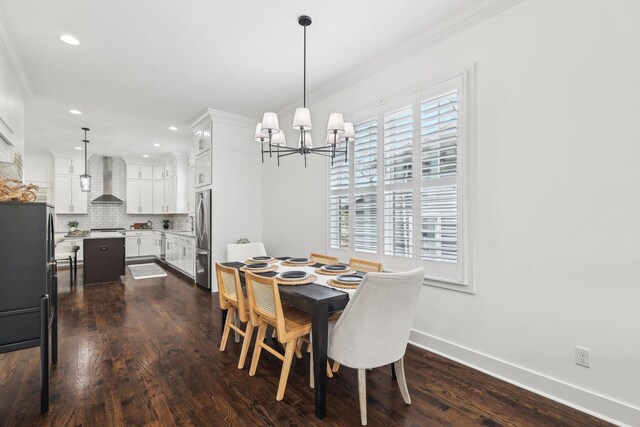 926 Acklen Ave Unit A, Nashville, TN 37203 - dining area featuring crown molding, a notable chandelier, dark wood-style floors, and baseboards