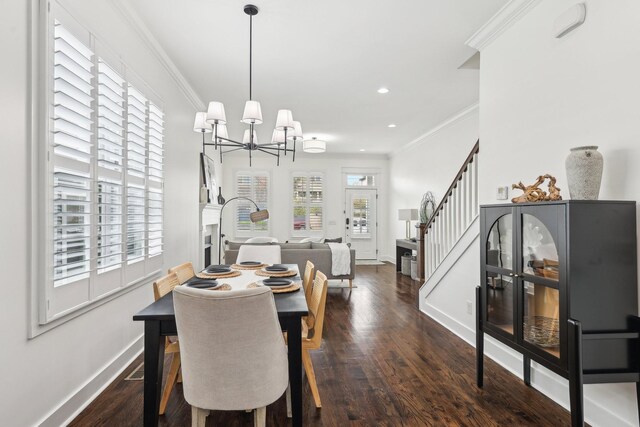 926 Acklen Ave Unit A, Nashville, TN 37203 - dining area featuring dark wood-type flooring, ornamental molding, a wealth of natural light, and a chandelier
