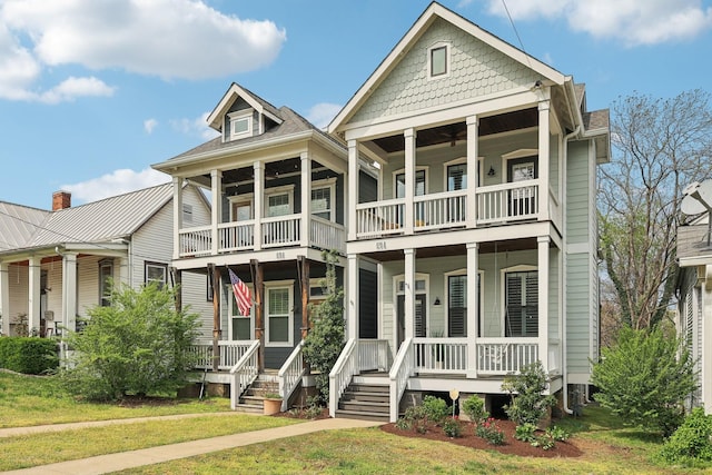 926 Acklen Ave Unit A, Nashville, TN 37203 - view of front of house with a porch, a front lawn, and a balcony