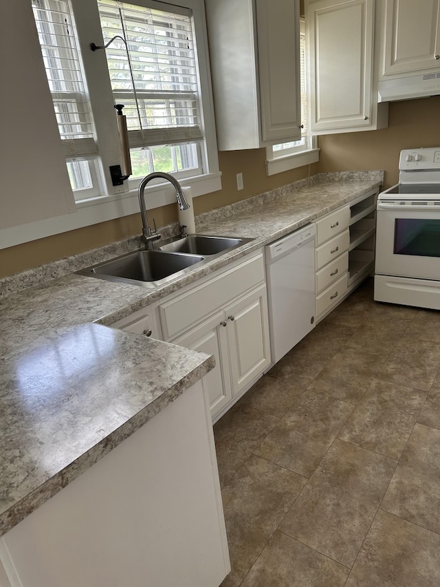 309 3rd Ave Unit 40, Fayetteville, TN 37334 - kitchen featuring white appliances, white cabinets, under cabinet range hood, light countertops, and a sink