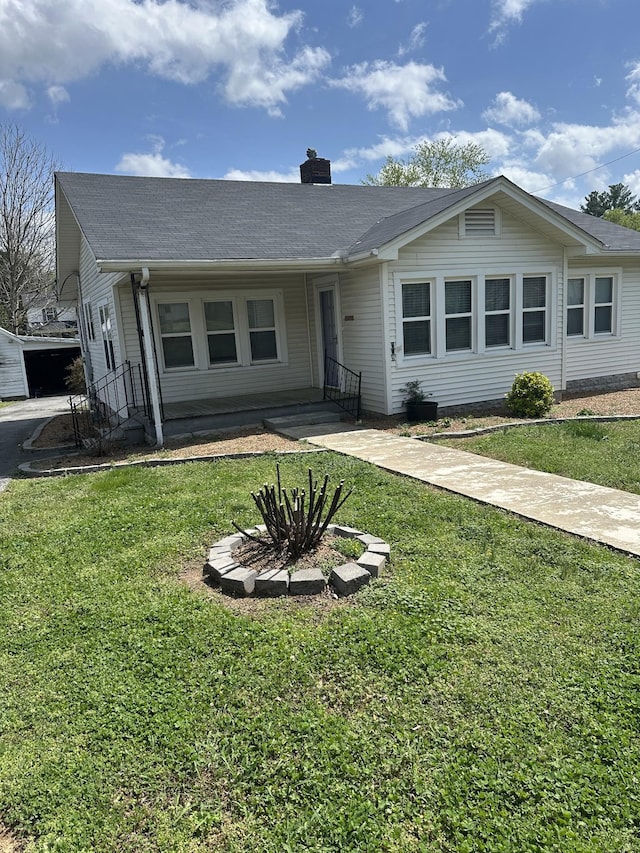 309 3rd Ave Unit 40, Fayetteville, TN 37334 - single story home with a chimney and a front lawn