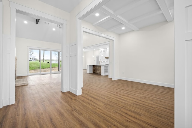 interior space with recessed lighting, dark wood-style flooring, coffered ceiling, baseboards, and beam ceiling