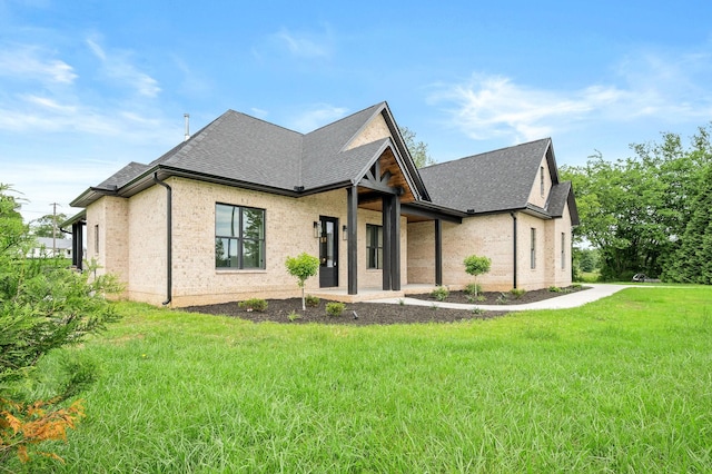 102 Victoria Ct N, Tullahoma, TN 37388 - view of front facade featuring roof with shingles and a front yard