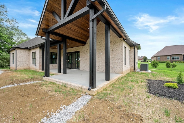 102 Victoria Ct N, Tullahoma, TN 37388 - view of side of property with a patio area and central AC unit