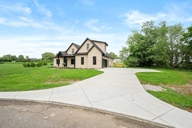 102 Victoria Ct N, Tullahoma, TN 37388 - view of front of home featuring a front lawn, driveway, and an attached garage