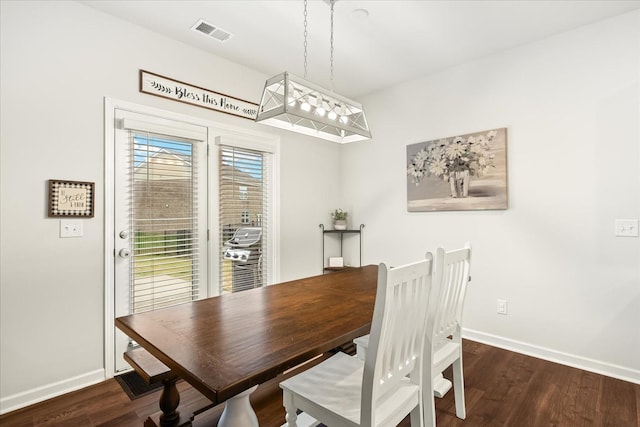 1428 Marigold Dr, Spring Hill, TN 37174 - dining area with visible vents, baseboards, a chandelier, and wood finished floors
