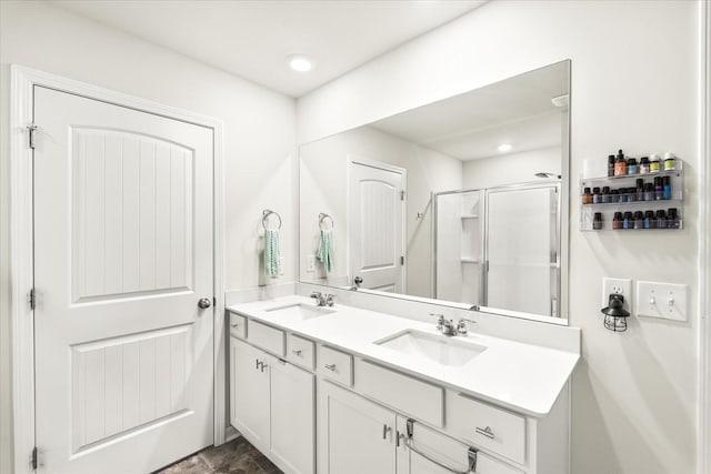 1428 Marigold Dr, Spring Hill, TN 37174 - bathroom featuring double vanity, a sink, and a stall shower