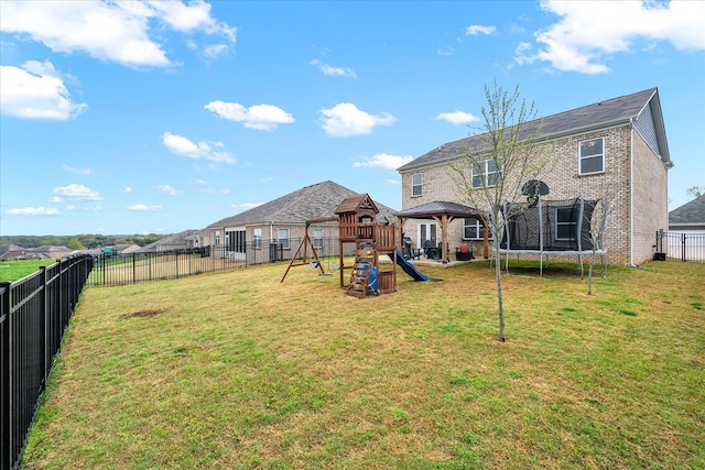 1428 Marigold Dr, Spring Hill, TN 37174 - view of yard featuring a trampoline, a fenced backyard, and a playground