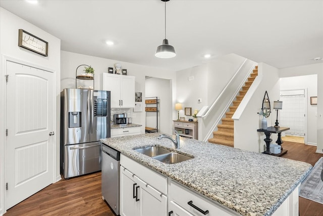 1428 Marigold Dr, Spring Hill, TN 37174 - kitchen featuring white cabinetry, a sink, stainless steel appliances, a center island with sink, and dark wood-style floors