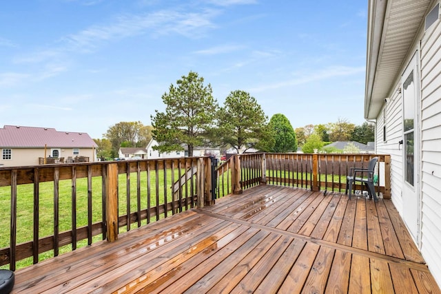 deck featuring a lawn