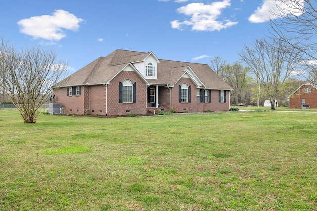 view of front of property featuring a front yard, brick siding, crawl space, and cooling unit