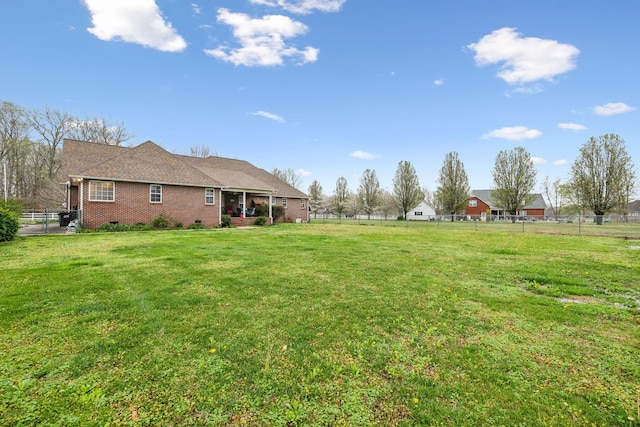 view of yard with fence