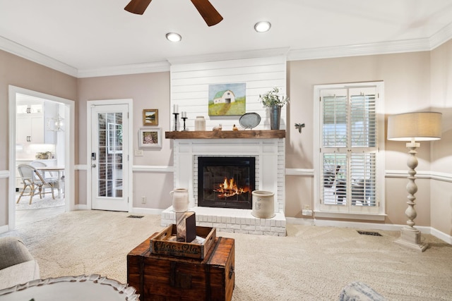 2009 Cedarmont Dr, Franklin, TN 37067 - carpeted living area featuring a fireplace, baseboards, crown molding, and ceiling fan