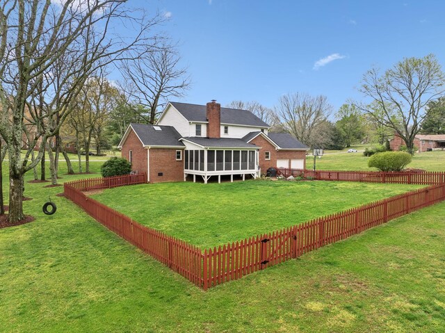 2009 Cedarmont Dr, Franklin, TN 37067 - view of yard with a fenced backyard and a sunroom