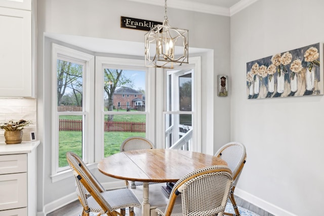 2009 Cedarmont Dr, Franklin, TN 37067 - dining room with a wealth of natural light, a chandelier, and baseboards