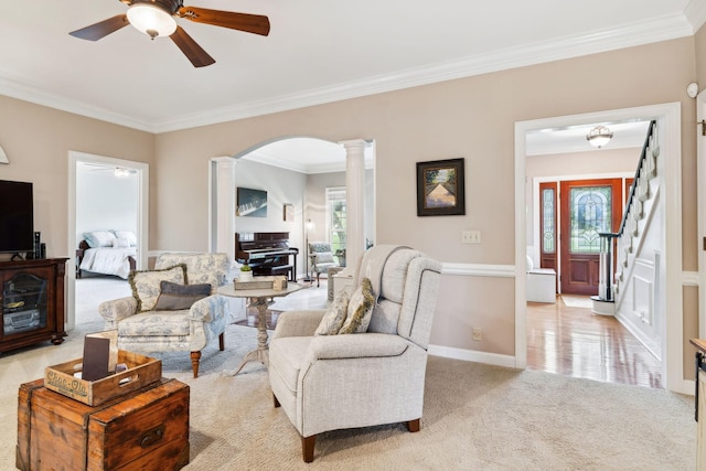 2009 Cedarmont Dr, Franklin, TN 37067 - living area with ceiling fan, decorative columns, ornamental molding, and carpet