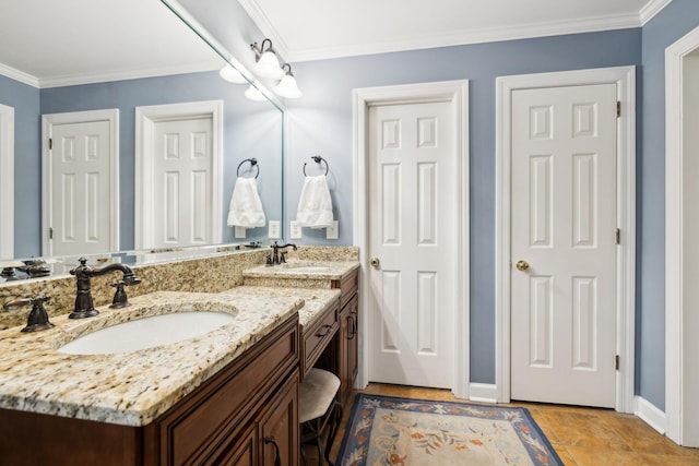 2009 Cedarmont Dr, Franklin, TN 37067 - bathroom with a sink, baseboards, double vanity, and crown molding