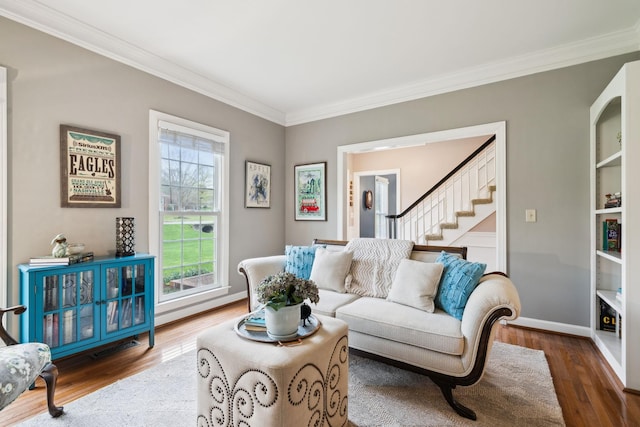 2009 Cedarmont Dr, Franklin, TN 37067 - living area featuring crown molding, wood finished floors, baseboards, and stairway