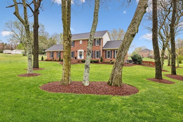 2009 Cedarmont Dr, Franklin, TN 37067 - view of front facade featuring brick siding and a front lawn