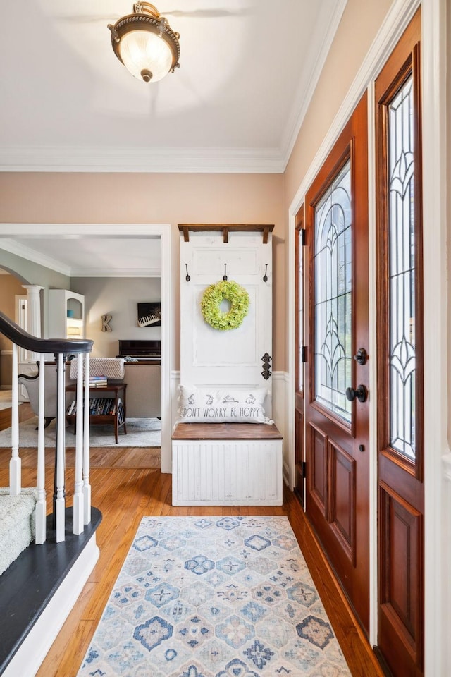 2009 Cedarmont Dr, Franklin, TN 37067 - entryway with arched walkways, crown molding, and wood finished floors