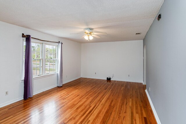 740 Kleeman Dr, Clarksville, TN 37040 - spare room featuring visible vents, a textured ceiling, light wood-style floors, and ceiling fan