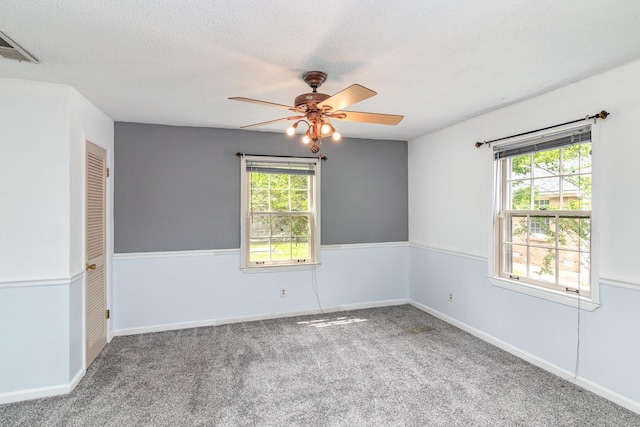 740 Kleeman Dr, Clarksville, TN 37040 - carpeted empty room featuring a textured ceiling, baseboards, ceiling fan, and visible vents
