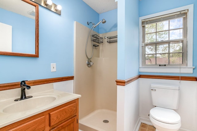 740 Kleeman Dr, Clarksville, TN 37040 - bathroom featuring a shower stall, toilet, vanity, and baseboards