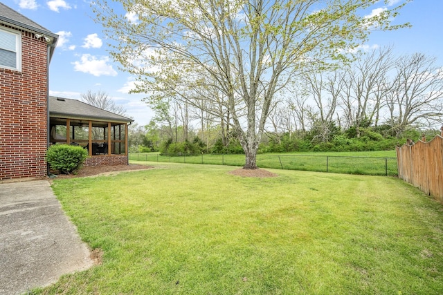 view of yard featuring a fenced backyard