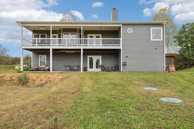 2728 Brown Hollow Rd, Columbia, TN 38401 - rear view of property with a yard, a chimney, french doors, and ceiling fan