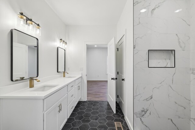 236 Amos Cir, Lafayette, TN 37083 - bathroom with a sink, visible vents, double vanity, and tile patterned flooring