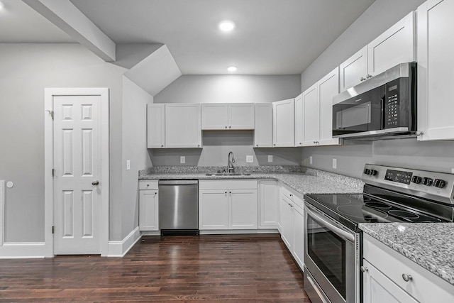 434 Caldwell Dr, Columbia, TN 38401 - kitchen featuring stainless steel appliances, a sink, dark wood-style flooring, recessed lighting, and light stone counters