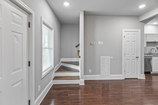 434 Caldwell Dr, Columbia, TN 38401 - corridor with a sink, dark wood finished floors, stairs, baseboards, and recessed lighting