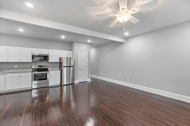 434 Caldwell Dr, Columbia, TN 38401 - kitchen with appliances with stainless steel finishes, baseboards, dark wood finished floors, and recessed lighting