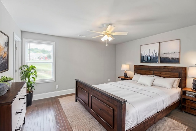 434 Caldwell Dr, Columbia, TN 38401 - bedroom with baseboards, dark wood-style flooring, and ceiling fan