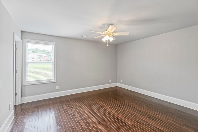 434 Caldwell Dr, Columbia, TN 38401 - unfurnished room with dark wood-style flooring, a ceiling fan, and baseboards