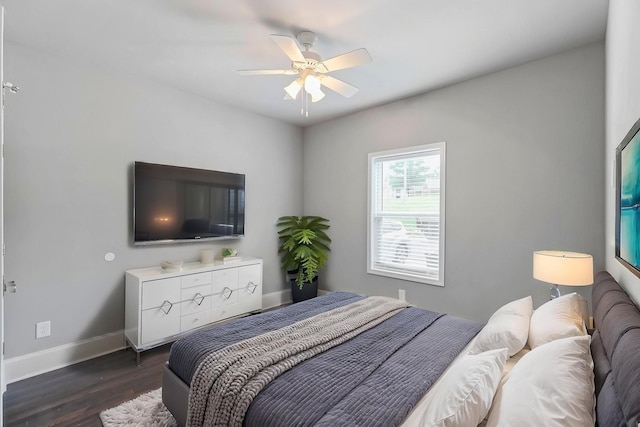 434 Caldwell Dr, Columbia, TN 38401 - bedroom with baseboards, dark wood-style flooring, and ceiling fan