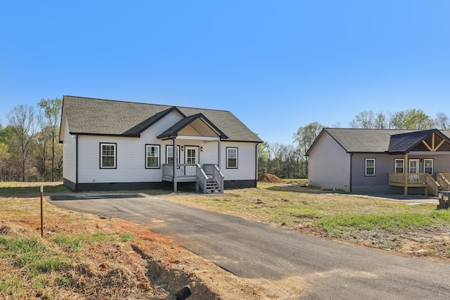 view of front of house with crawl space
