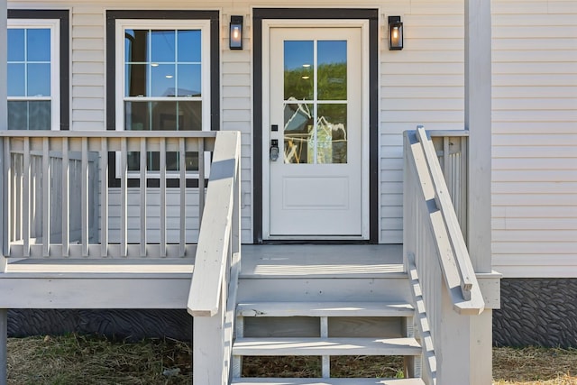 entrance to property with covered porch