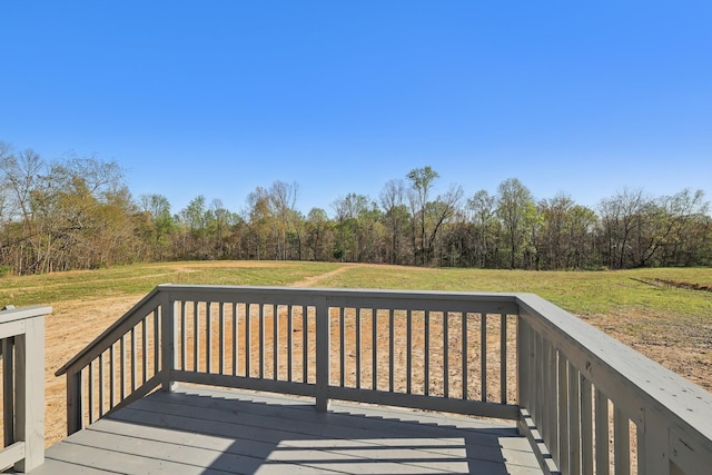 deck featuring a yard
