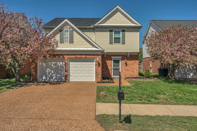 view of front of property with brick siding, concrete driveway, a garage, and a front yard