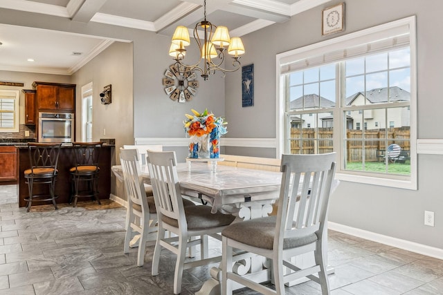 1328 Winterset Dr, Clarksville, TN 37040 - dining space with plenty of natural light, a chandelier, crown molding, baseboards, and beam ceiling