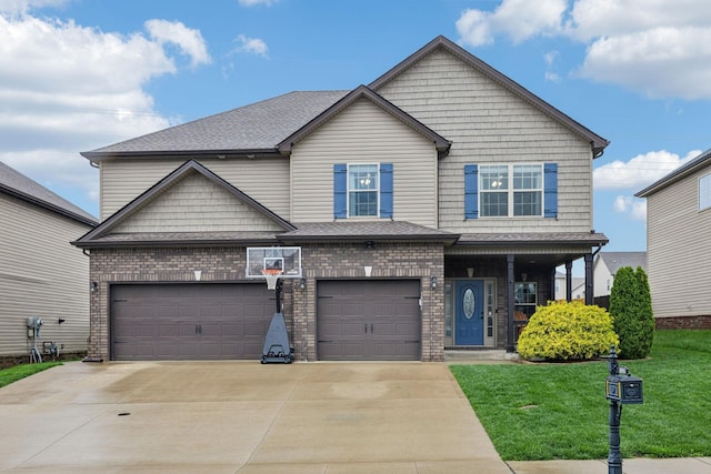 1328 Winterset Dr, Clarksville, TN 37040 - view of front of house with driveway, a front lawn, brick siding, and roof with shingles