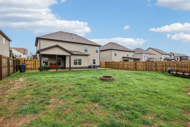 1328 Winterset Dr, Clarksville, TN 37040 - rear view of house with an outdoor fire pit, a patio, a residential view, and central air condition unit