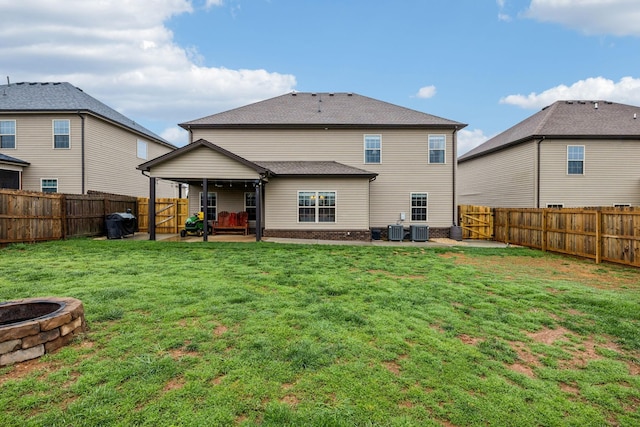 1328 Winterset Dr, Clarksville, TN 37040 - back of property with a patio, a fire pit, and central AC