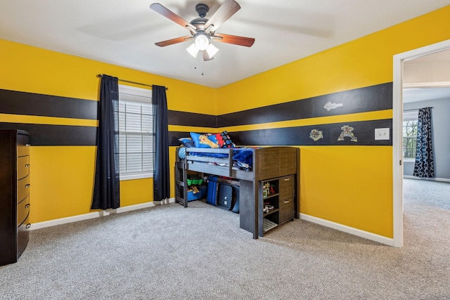 1328 Winterset Dr, Clarksville, TN 37040 - bedroom featuring carpet flooring, baseboards, multiple windows, and ceiling fan