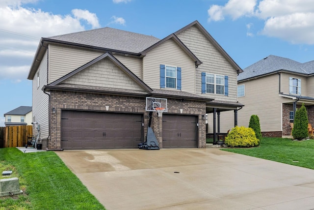 1328 Winterset Dr, Clarksville, TN 37040 - view of front of property featuring driveway, a garage, and brick siding
