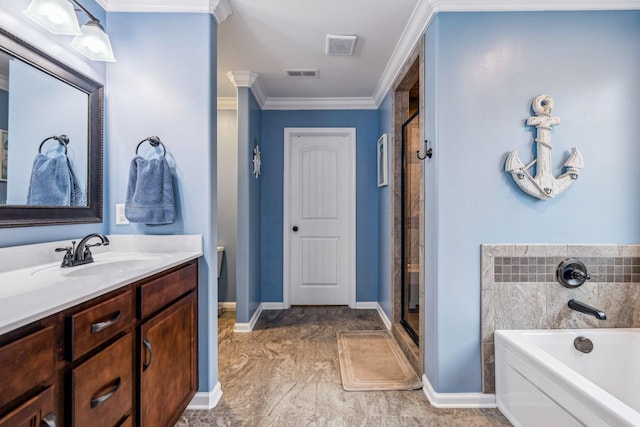 1328 Winterset Dr, Clarksville, TN 37040 - bathroom featuring a garden tub, vanity, ornamental molding, a shower stall, and baseboards